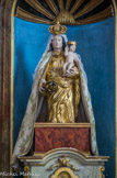 <center>L'église Saint Martin.</center>  La statue « miraculeuse » de la Vierge d'Hubages, vénération constante des habitants de Dauphin, est taillée de manière assez fruste dans un simple tronc d'arbre. Elle remonte à une époque incertaine, mais sûrement ancienne. Les traits du visage en sont très fins, et l'Enfant Jésus, encore d'inspiration gothique, parait plus antique que la statue elle-même. La légende dit qu'elle aurait été enfouie au temps des Guerres de Religion pour la soustraire à la profanation et qu'elle aurait été découverte plus tard par le mulet d'un laboureur. Lors des fêtes qui se célèbrent en sa chapelle, la statue y est ramenée et placée sur son autel.