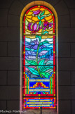 <center>Chapelle Notre-Dame de la Fleur.</center>Maison de ste Brigitte et le lys martagon de Roche Cline. Au-dessous l'inscription : chapelle consacrée par Mgr Cosme-Jorcin le 26 mai 1947.