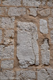 <center>Cathédrale Notre-Dame de la Nativité</center>Inscription commémorative de la célébration du tauribole. Inscription : IDAEAE MATRI VALERIA MAR CIANA VALE RIA CARMO SINE ET CASSI VS PATERNVS SACERDOS TAV RIBOLIVM SVOSV IV CELERRAVERVN. Traduisible par A la mère Idéenne, Valeria Marciana, Valeria Carmosine et Cassius Paternus prêtre, à leurs frais, ont célébré le Tauribole. Valeria Marciana, Valéria Carmosyne et le prêtre Cassius Paternus ont célébré un taurobole (sacrifice) en l'honneur de la mère Idaea. Cette pierre évoque d'une part le culte de Cybèle, et d'autre part la mère « Idaea », la Grande Mère des dieux du mont Ida. Un appellatif qui dérive des légendes asiatiques liées à cette déesse. C'est la rencontre de la tradition crétoise avec celle de l’Orient.
