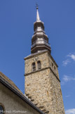 <center>Combloux, église saint Nicolas.</center>Le clocher a été abattu lors de la Révolution. Grâce  à  l’élan  donné  par  un  vicaire nommé Dutruel et la générosité des habitants, la tour et  le  clocher  furent  rebâtis  en 1828 dans sa forme actuelle.