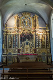 <center>Combloux, église saint Nicolas.</center>Le retable central est la principale œuvre d’art, 
réalisé au 18ème siècle en bois sculpté et polychrome.