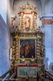 <center>Combloux, église saint Nicolas.</center>Le retable latéral a été reconstitué et restauré en 1972, par les Monuments Historiques, à partir d’éléments d’anciens autels de l’église.