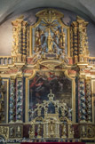 <center>Combloux, église saint Nicolas.</center>Les statuettes dorées à l'or fin de St Pierre et St Paul encadrent le tabernacle. Le tableau représente l'Annonciation.