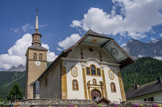 <center>Eglise de la Sainte Trinité des Contamines Montjoie</center>La date de construction de l'église se lit sur quatre tirants de fer forgé aux angles de la façade : 1759.