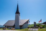 <center>Église Notre-Dame-de-Haute-Lumière aux Saisies.</center> La chapelle Notre Dame de Haute au col des Saisies est une chapelle moderne construite en 2000 sur l’initiative d’une association l’ A.C.C.S. (Association pour la Construction de la Chapelle des Saisies). Il n’existait pas de chapelle avant et le village station ne date que des années soixante.