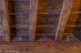 <center>Le Musée d'Art Sacré du Gard. </center> Entre chaque solive, des scènes de genre, de chasse, de lutte, de danse et entre chaque scène des blasons peints. La partie la plus importante est celle du coté de la cheminée. Ici, c'est sans doute un élève du maître qui a travaillé, car dans la salle du dessus, les dessins sont de meilleure qualité.