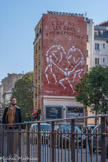 Grande peinture murale rue de Ménilmontant,  C’est nous les gars de Ménilmontant de Jérôme Mesnager, 1995.