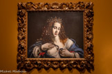 <center>Giovanni Francesco Guerrieri</center>(Fossombrone, 1589 - Pesaro, 1657) Cléopâtre
Vers 1630 Huile sur toile
Fano, Fondazione Cassa di Risparmio di Fano. <br>
Peintre de style caravagesque dans- l’Italie baroque, Guerrieri représente avec raffinement un modèle idéal de féminité avec cette Cléopâtre, tragique et sensuelle, tenant l’aspic sur sa poitrine : sa chemise en dentelles dévoile sa gorge laiteuse mordue par le serpent comme une étrange blessure d’amour.