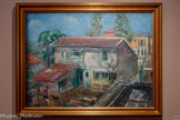 <center>Musée de Montmartre</center>CHARLES CAMOIN 0879-1965). La Maison de Paco Durrio dans le Maquis, 1927
Huile sur toile
Musée de Montmartre, collection Le Vieux Montmartre, inv. A.3572
Don de Lola Camoin 1973
Restauration réalisée en 2023 grâce au soutien de la DRAC Ile-de-France
Arrivé à Pans en 1898, Camoin suit les cours de Gustave Moreau à FEcole nationale des Beaux-arts. Il s’installe à Montmartre dès 1907 : en 1908, il loue un atelier au 14, rue Cortot ; entre 1910 et 1925, il vit au 46, rue Lepic ; il s’établit finalement au 2 bis, avenue Junot où il habite jusqu’à sa mort, alternant avec son logement de Saint-Tropez.
Proche de Matisse et de Marquet, il partage avec les fauves des spécificités formelles communes (simplification des formes, autonomisation relative de la couleur et aplantssement de Vespace). Toutefois, il s’en distingue par son refus de la théonsation, sa rigueur constructrice et sa spontanéité créatrice.
Cette oeuvre, caractéristique de la période d'après-guerre du peintre, représente Paco Dumo, sculpteur espagnol de la bonde de Picasso, établi dans Tancien maquis de Montmartre.