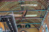<center>Musée des Arts et Métiers.</center> Aéroplane Blériot XI. Louis Blériot 1909.
L’ingénieur centralien Louis Blériot fait fortune, au début du XXe siècle, grâce à son entreprise de phares pour automobiles. Passionné par l’aviation, il construit douze aéroplanes en une dizaine d’années, mais les piètres performances de ses premières réalisations lui valent le surnom de « l’homme qui tombe toujours ». Après plusieurs années de recherches, il parvient à réaliser un aéroplane léger, solide et fiable. D’une longueur de 8 mètres, le Blériot XI a une envergure de 7,20 mètres et pèse 310 kilogrammes. Il est équipé d’un moteur Anzani de 25 chevaux à trois cylindres en éventail.
Le 25 juillet 1909, Louis Blériot accomplit avec cet appareil l'un des tout premiers exploits aéronautiques. À 4 h 41, il décolle de Sangatte (Pas-de-Calais). L’aéroplane vole à 60 km/h vers les falaises britanniques. En 32 minutes, l’homme et sa machine parcourent la distance entre la France et la Grande- Bretagne. Ce matin d'été, à 5 h 13, « l’Angleterre n’est plus une ile » : Louis Blériot vient d’effectuer la première traversée de la Manche en avion. Son exploit est abondamment relayé par la presse.
En octobre 1909, le journal Le Matin offre cet aéroplane au Conservatoire des arts et métiers. Au fond,  les figures de l’Agriculture et de l’Industrie trônant au-dessus de l’arc brisé.