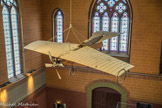 <center>Musée des Arts et Métiers.</center> Aéroplane Esnault-Pelterie. Les commandes de l’avion se limitent à deux leviers de l'assiette et de l’orientation. Robert Esnault-Pelterie modifiera ce système pour mettre au point un levier unique, « le manche à balai », pour lequel il déposera un brevet. Le REP 1 s’avérera difficile à faire voler, mais toutes les innovations réalisées par Esnault-Pelterie contribuent au développement de l’aviation. Il fait don de son aéroplane au Conservatoire en juin 1920.