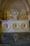 <center> La crypte. </center>En haut, Louise de France. 1737-1787. Fille de Louis XV. Mère supérieure du carmel de Saint-Denis. 
Elisabeth de France. 1764-1794. Sœur de Louis XVI. Adélaïde de France. 1732-1800. Fille de Louis XV. Victoire de France. 1733-1799. Fille de Louis XV. Les quatre médaillons sont des fragments d'un important tombeau fait par J.-B. Beaumont. 1829, marbre.
En bas, Charles de Valois. 1573-1650. Duc d'Angoulême, fils naturel de Charles IX et de Marie Touchet, adopté par Diane de France, fille d'Henri II et Filippa Duci. Soubassement d'un tombeau qui comprenait un gisant et un sarcophage. 1840, marbre.