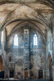 <center>L'église des Dominicains. </center>Le cloître est bâti au sud-ouest de l'église vers 1560, au centre du bâtiment conventuel. La porte au décor flamboyant qui en est un  vestige s'ouvre alors vers le Rhône pour l'entrée des fidèles. En 1601, une belle porte classique est édifiée au sud de l'église (rue du Dr. Fanton). Après la révolution, l'église a été  vendue en 26 lots et abritait remises et garages jusqu'à la grande campagne