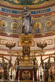 <center>Notre-Dame de la Garde</center>Grâce à un don de 3 000 F fait par la duchesse d'Orléans lors de son passage à Marseille en mai 1823 et à diverses offrandes, la confection d'une nouvelle statue de la Vierge est envisagée afin de remplacer celle qui avait été envoyée à la fonte à la Révolution. En 1829 on demande à l'orfèvre Jean-Baptiste Chanuel, artiste marseillais installé rue des Dominicaines, de confectionner cette statue d'après un modèle réalisé par le sculpteur Jean-Pierre Cortot.  Le modèle fut massé par le sculpteur Cortot, la statue elle-même fut faite au repoussé, selon le procédé de Benvenuto Cellinipar l'artiste Chanuel, en six ans.