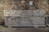 <center>Sarcophage allégorique.</center>Ve siècle, fragments d'une grande face et de son couvercle décorés, pierre de Cassis. La scène centrale est restituable à partir de dessins du XVIIe siècle et du commencement du XIXe siècle. Au centre, le Christ sous la forme de l'Agneau, se dresse sur la montagne d'où s'écoulent les Quatre fleuves ; de part et d'autre, un cerf placé de profil s'abreuve en avant de deux palmiers. À chacune des extrémités se trouve une scène à signification eucharistique, à gauche le miracle de Cana et à droite la multiplication des pains.
Sur la frise du couvercle, deux groupes de trois agneaux séparés fun de l'autre par des palmiers convergent vers le chrisme central contenu dans une couronne. Le thème s'apparente à celui de la face postérieure de l'autel paléochrétien actuellement placé dans la chapelle du Saint-Sacrement Chacune de ces deux processions d'agneaux était issue d'une porte de cité que l'on peut identifier, en se fondant sur des décors absidiaux, comme les villes de Jérusalem et de Bethléem.