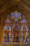 <center>Église Saint-Germain-l'Auxerrois.</center> Le Baptême du Christ. Dans le médaillon du haut, représentation du Père. Juste en dessous, à moitié caché, le Saint Esprit figuré par une colombe.