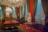 <center>Le musée Chinois. </center>Le musée Chinois, installé en 1863 par l'impératrice Eugénie au rez-de-chaussée du Gros Pavillon, a été constitué grâce au butin de l'expédition franco-anglaise contre la Chine en 1860, jouissant notamment de la mise à sac du Palais d'Été de l'Empereur[33], et grâce à la venue en 1861 d'une délégation d'ambassadeur siamois qui complètent la collection par plusieurs présents. La scène est d'ailleurs illustrée par une peinture de Gérôme. Les salons qui composent ce musée, aux décor de style Second-Empire, furent restaurés en 1991.
Le grand salon, vaste salle de 17 mètres sur 4 mètres, présente des objets d'Extrême-Orient en tant qu'éléments décoratifs. Le salon est meublé de trois tables recouvertes de tapis cramoisis à franges vertes, de dix-huit chaises légères en bois verni de noir fabriquées à Chiavari, en Italie, de canapés, de divans, et de fauteuils garnis de cotteline verte, de lampas de style chinois ou de cuir.