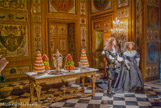 <center>Salle des Buffets. </center> Cette salle fut l'une des premières, en France, a être régulièrement utilisée comme salle à manger, par Fouquet. Les plats y étaient apportés des lointaines cuisines sur des réchauds.
La décoration de cet ensemble - plafond, boiseries - est due à Charles Lebrun. Six grands médaillons inclus dans la boiserie retracent l'histoire d'Io.
Les panneaux à fond blanc rappellent les décorations des loges de Raphaël au Vatican. Sur les parties inférieures on observe des motifs de jeux d'enfants.