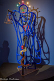 <center>L'Ermite,</center>ici représenté avec le serpent tentateur, lointain souvenir de la Vierge Marie foulant aux pieds la bête maléfique. 1988. Acier avec résine de polyester peint et ampoules électriques. NIKI CHARITABLE ART FOUNDATION
