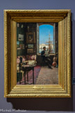 <center>Intérieur d'atelier</center>Joseph Garibaldi Marseille, 1863 - 1941
Vers 1889, Huile sur toile.
Formé à l'école des Beaux-Arts de Marseille, Garibaldi sera comme Jean-Baptiste Olive élève d'Antoine Vollon à Paris. Il fera sa spécialité des vues pittoresques des villages du Midi et des ports de Cassis et Marseille. Sa pratique de la photographie transparait dans le réalisme puissant de ses paysages peints dans une lumière crue. Un homme en costume de ville, lit son journal devant la fenêtre de son atelier du quai de Rive- Neuve, dans un spectaculaire contre-jour. Garibaldi offre en quelque sorte une version marseillaise des Parisiens à leur fenêtre d'un Caillebotte. Les œuvres accrochées au mur étant difficilement identifiables, il n'est pas possible de savoir si cet atelier est le sien ou celui d'un autre artiste.