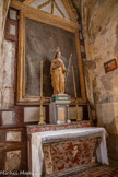 <center>Monestiès. L'église Saint-Pierre.</center>Sainte Geneviève tient de la main gauche la houlette, le bâton de berger terminé par une plaque de fer en forme de gouttière. De l'autre main, elle tient un livre ouvert. 17e siècle. Bois : taillé, peint (polychrome). Retable de la deuxième chapelle sud. Le tableau est surmonté d'un fronton triangulaire. Tableau : Religieuse en extase. 4e quart 18e siècle. Bois : taillé, peint, doré ; toile (support) : peinture à l'huile.