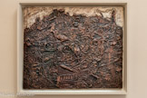 <center>Abbaye de Beaulieu-en-Rouergue  </center>Jean Dubuffet (Le Havre, 1901 - Paris, 1985) 
Barbe de désintégration des injures Novembre.
Huile sur toile.
Jean Dubuffet utilise les matières et les techniques les plus diverses pour créer des formes artistiques inédites. Ce travail matiériste reçoit le nom de Texturologie.
Cette œuvre fait partie d'une série, les Barbes, exécutée avec des dessins, des assemblages d'empreintes ou de tableaux. Dubuffet l'achève par un poème. As-tu cueilli la fleur de barbe, qu'il déclame dans le cadre de ses expériences musicales. Le dépouillement et l'austérité de cette toile séduisent Geneviève Bonnefoi, qui la reçoit en cadeau de l'artiste en 1961.