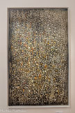 <center>Abbaye de Beaulieu-en-Rouergue  </center>Simon Hantaï (Biatorbàgy, Hongrie, 1922 - Paris, 2008)
Peinture
1958
Technique mixte sur toile.
À la fin des années 1950, la touche de Simon Hantaï se miniaturise. Ici, des zones orangées et rougeâtres affleurent d'une composition évoquant un buisson-ardent Ces petites touches recouvrent la quasi-totalité de la toile en un fascinant continuum visuel.
Dans la monographie qu'elle consacre à Simon Hantaï en 1973, Geneviève Bonnefoi écrit :
« Une impression de paix émane de cette turbulence dominée, un appel à la méditation et au silence, éclairé d'une sorte de joie intérieure ».
