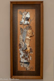 <center>Abbaye de Beaulieu-en-Rouergue  </center>Ida Karskaya (Bender, U.R.S.S., 1905 - Paris, 1990)
Collage d’écorces et branches dit « Forêt »
1955
Essences diverses de bois, écorce et cuir collés sur isorel
Dans ce collage dit « Forêt d'Automne », Ida Karskaya a savamment agencé des écorces autour d'une branche d'arbre, axe vertical de la composition. À la fois texture, forme et couleur, la matière conserve son intégrité et déploie toutes ses ressources. Plutôt qu'un paysage, c'est un dépaysement que propose l'artiste. À travers des éléments glanés, elle introduit dans son œuvre le réel et le hasard. Elle rend ainsi compte d’une nature non contrainte, libre de toute représentation.