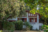 <center>Arcachon, quartier Pyla, ville de Printemps</center>Louis Gaume… Ce nom évoque à lui seul une page d’histoire d’Arcachon et un style, celui des maisons « néo basques » du quartier pilat-plage à Arcachon: faux colombages ( le plus souvent de couleur rouge ou verte ) sur murs clairs, huisseries et garde-corps des balcons en bois, toits en tuile. C’est son association avec Daniel Meller (propriétaire de pas moins de 143ha de forêts entre le Moulleau et la dune du Sablonneys) qui marquera le début de l’empire familial.
A l’instar de la ville d’Hiver, Louis Gaume ambitionne de créer son propre univers et c’est exactement sur les 143ha de Daniel Meller que sera construit le quartier de Pilat-Plage.