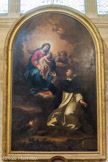 <center>Eglise Notre Dame</center>SAINT DOMINIQUE RECEVANT LE ROSAIRE DE LA VIERGE MARIE
Signé : f. ANDRE PARISINUS ORD PRAED, PINXIT AN 1712
Ce tableau évoque l'apparition de la Vierge Marie à Albi en 1210. Dans la ferveur de ses prières Saint Dominique a vu la Vierge Marie lui remettre un rosaire et les Dominicains se sont depuis attachés à propager cette dévotion dans le monde.
La Vierge est assise sur des nuages et tient l'Enfant-Jésus dans ses bras. Un bel effet de lumière dorée auréole son visage tandis que saint Dominique, dans une attitude très noble, montre, par le mouvement de ses mains, son ardeur à recevoir ce précieux présent.
En bas dans l’angle gauche, le frère André n’a pas oublié le chien de la légende de saint Dominique, qui tient dans sa gueule le flambeau.