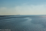 <center>Saint-Nazaire. </center> Le port, vue du pont. Au loin, raffinerie de Donges.