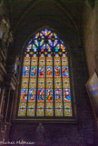 <center>Guérande. </center> La verrière de saint Joseph., verrière hagiographique de Henri Uzureau, peintre-verrier à Nantes, réalisée en 1935. De bas en haut et de gauche à droite : le grand-prêtre, demandant à Dieu un signe désignant l'époux qu'Il  destinait à Marie, le bâton de Joseph fleurit et une colombe survole la tête de l'élu. ; le mariage de Marie et de Joseph ; voeux de chasteté, Marie agenouillée et Joseph debout derrière font à Dieu le don de leurs personnes ; le songe de Joseph ; l'arrivée à Bethléem de Marie et Joseph ; la Nativité. Second registre ; la fuite en Egypte ; le repos pendant la fuite en Egypte ; la vie à l'atelier de Nazareth ; Marie et Joseph enseignent la prière à Jésus ; le recouvrement de Jésus au Temple ; la mort de saint Joseph.