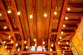 <center>Le château Laurens</center>Le grand vestibule. Les peintures du plafond sont encadrées par des caissons en bois, imitation de poutres. Ce plafond de bois est parsemé de petites lampes de verre couleur
absinthe évoquant un ciel étoilé.