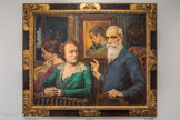 <center></center>Musée Hyacinthe Rigaud. <br> George-Daniel de Monfreid
(New-York, USA, 1856 - Corneilla-de-Conflent, 1929)
Hommage à Gauguin ou Groupe de famille (en souvenir de Paul Gauguin)
1925
Huile sur papier
Isolé aux îles Marquises, Gauguin lui adresse en 1896 son autoportrait dédicacé a «mon ami Daniel» qui semble être le sujet de cette étonnante composition.
De part et d’autre, la Barque et le Masque de Tehura, autres œuvres de Gauguin. Au premier plan, trois personnages que rien ne relie: le peintre, sa belle-sœur et sa femme. Regards, mains, postures n’établissent aucun lien entre des personnages absents et isolés faisant des œuvres de Gauguin le véritable cœur du tableau.