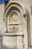 <center>Eglise des Aygalades, Notre-Dame du mont Carmel. </center> Fontaine réalisée en 1869, alimentée à l'origine par les eaux de la source dite de sainte Madeleine.