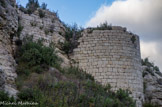 <center>Ruines du château de Saint-Marcel.</center>La tour sud et la courtine. Fin Ve siècle : construction d’un castrum, avec tours et hauts murs maçonnés, nommé « Castellum Massiliense », dans lequel est érigée une chapelle dédiée à Saint Clair.
A partir de 710, le territoire subit les invasions sarrasines. 732 : destruction du château par les Sarrasins.
1059 : reconstruction du château sous le nom de « Castellum Sancti Marcelli », par Pons II, évêque de Marseille (1008 - 1073).
Au cours des siècles suivants, les terres de Saint-Marcel, et son château féodal, font l'objet de moultes transactions et querelles entre Comte de Provence, Vicomte de Marseille, les échevins de Marseille, le Prince des Baux, l'Abbaye de St Victor, l'Évéché de Marseille, etc... 
Il ne faut pas oublier qu'à cette époque, Saint-Marcel est une seigneurie indépendante de la ville de Marseille et que la Provence n'est pas une province du royaume de France.
1212 : cession de la propriété et du bâtiment par Rocelin, moine et vicomte à l’abbaye de Saint Victor.

1262 : donation du bâtiment par l’abbaye de Saint Victor à ses alliés, tels les comtes de Provence.