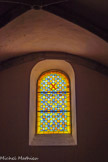 <center>L'église Saint-Trophime-Saint-André</center>Le vitrail avec la croix de Saint André.